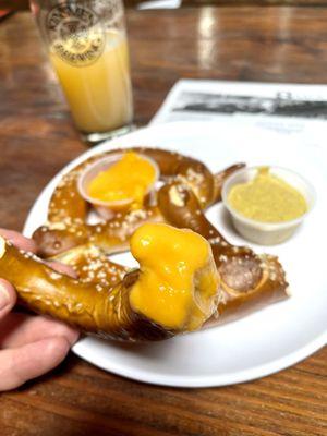 Sauced - Jumbo pretzel with beer mustard + cheese sauce ($1 extra) & Unpraised ipa