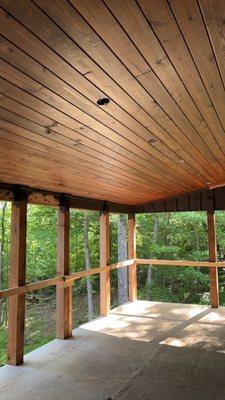 Cedar posts on our elevated outdoor space.