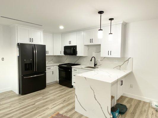 New remodel kitchen. Waterfall countertop, all wood cabinets, soft close doors.