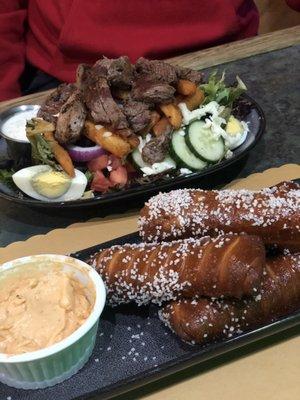 Pretzels with beer cheese and steak salad