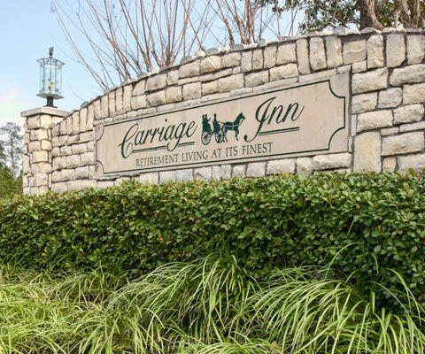 Entrance - Senior Living Apartments. Near the incredible woodlands of Sam Houston National Forest.