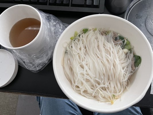 Pho: beef broth, noodles, beef, spinach, green onions, bean sprouts. To go