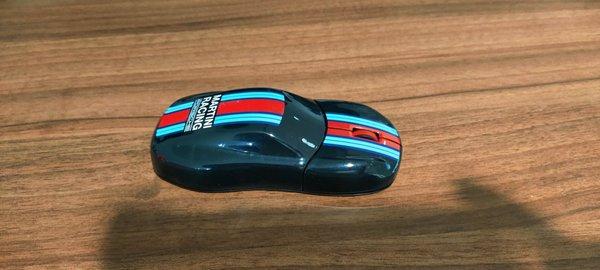 Porsche shaped computer mouse for $125 in the gift shop