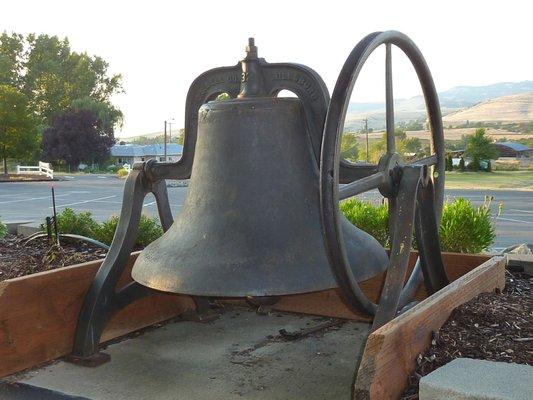 Traditional bell in parking lot