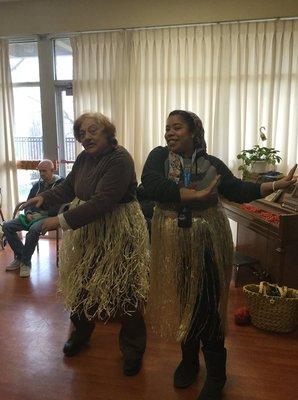 Members dancing to wonderful Hawaiian music.