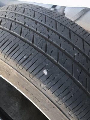 Another image of the same tire that Ali lied about repairing at this service center.