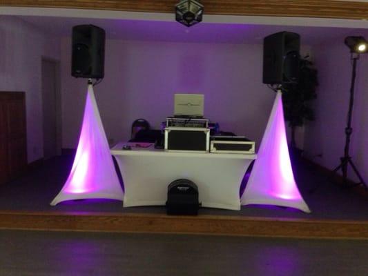 Base set up with purple accent lights with white scrims.