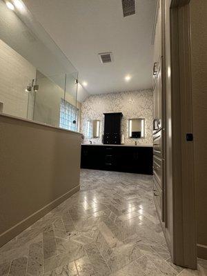 The original shower and unused garden tub were against the back wall where the vanity is now.