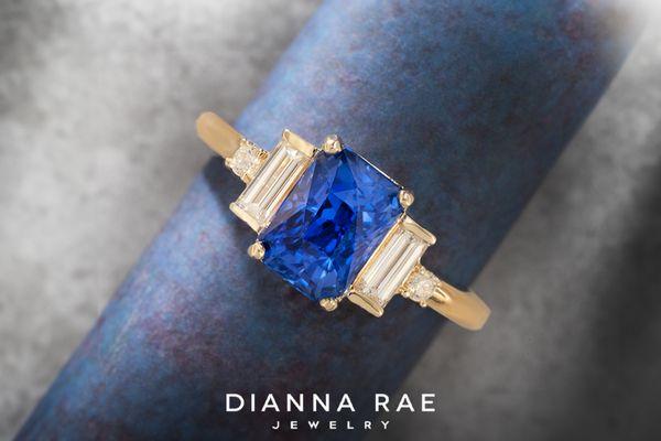 Radiant cut sapphire with baguette diamonds