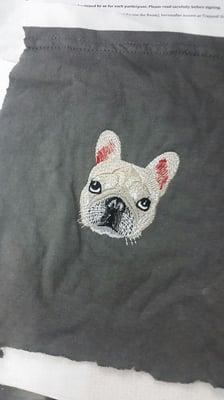 Custom embroidery of a customer's best freind.