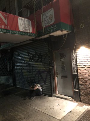 A homeless, former employee sleeping in front of the closed restaurant. Allegedly, he slept in the backyard too.