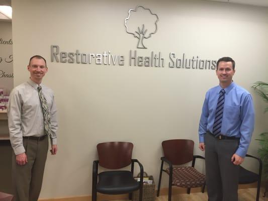 Dr. Warren (left) and Dr. Deglmann (right) at our office in Edina.