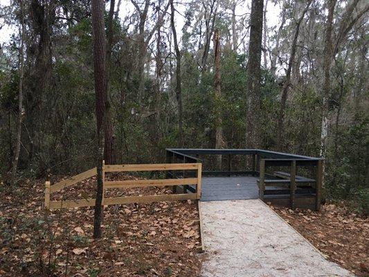 Deck overlooking the passing creek below