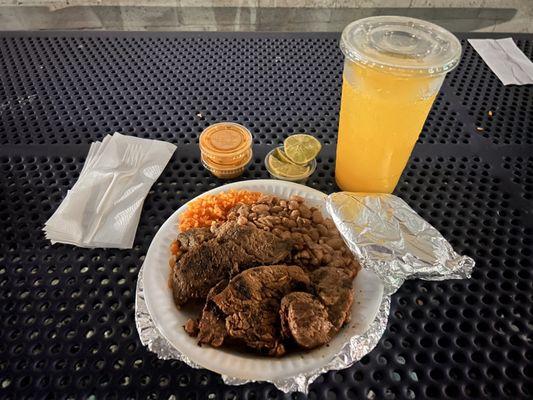 Carne Asada plate with rice and beans! Pina Drink.