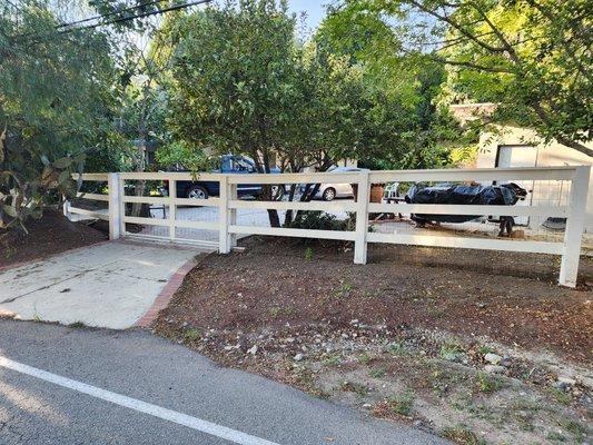 Custom wood fence installations, design provided by Craig's Tree Service