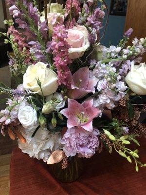 Large bouquet of white and pink flowers, with rose gold accent pieces