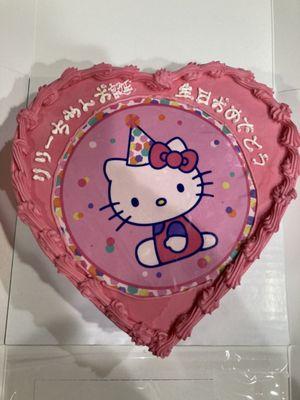 Pink heart shaped Hello Kitty cake