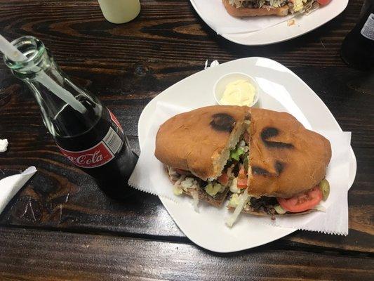 Torta de Carne Asada with a bottle of coke. Yum!!