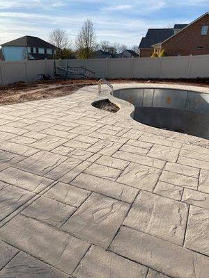 Inground pool build with custom concrete. Built by us.