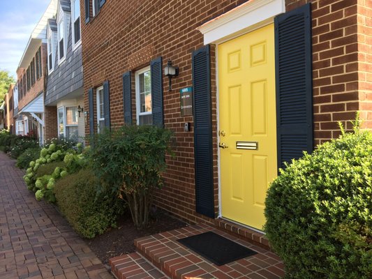 Unit #205 yellow door is office of Evergreen Properties, Ending unit.