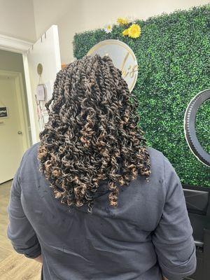 Shoulder length kinky twist. done in three hours.