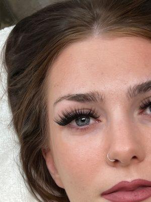 Wispy Mega volume eyelash extensions. Full base with long textured tips