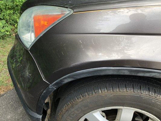 Honda CR-V fender-Baseball Size Dent Repaired