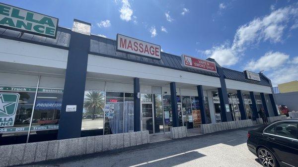 Shop front. Plenty of parking in the front and the back entrance.