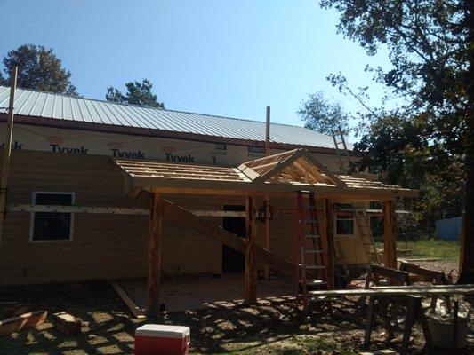 House framed. Lp smart siding, and a cool ranch style porch with a gable accent