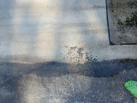 Partial power washing of a driveway