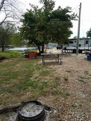 In order to really see the lake/marina, you have to hang out in the back of your rig. Firepits could be a bit bigger.