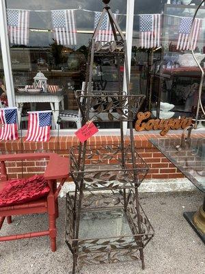 Iron glass shelves perfect for plants outside.