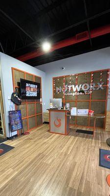 Front desk. This is where the awesome staff greet you, assist in selling Hotworx merchandise, and answer all your workout questions.