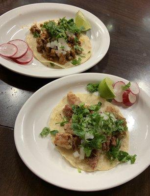 Taco de tripa (bottom), taco al pastor (top)