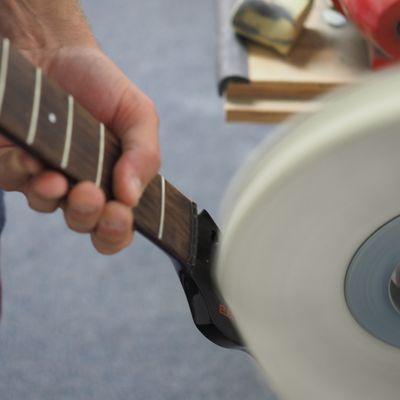 Buffing the headstock to look like new