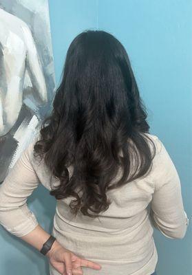 Hair was at waist. Requested to keep length. Cut a large amount of hair. I curled hair to try and hide uneven cuts.