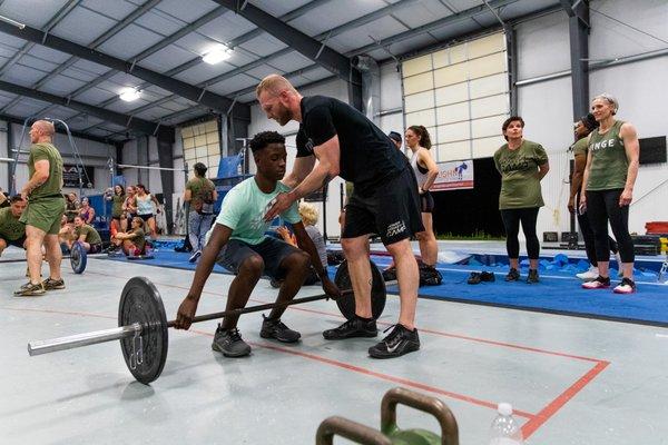 Owner Zach Filer coaching a teen member