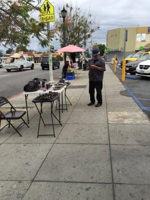 It's always like a swapmeet in front of this bank