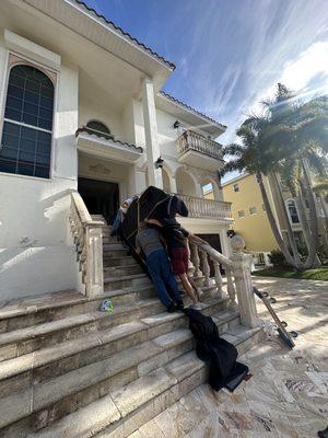 Moving a baby grand piano upstairs