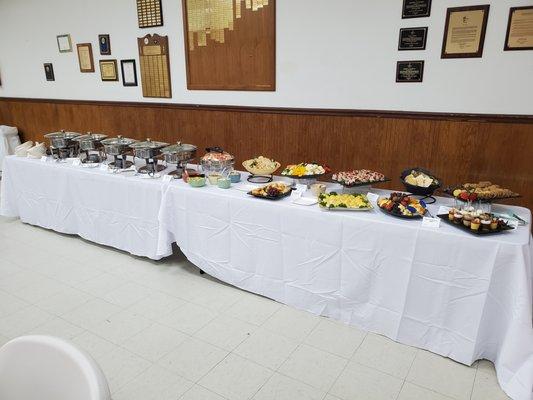 Catering tables on both sides with plenty of room for caterers.