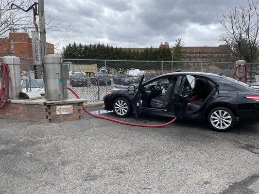 Uber driver getting ready for a busy Friday knowing that a clean car makes more money