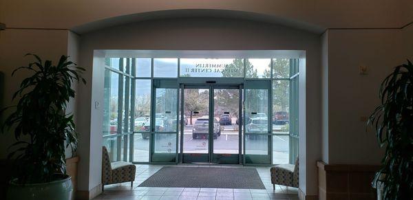 Interior of lobby looking out to parking lot