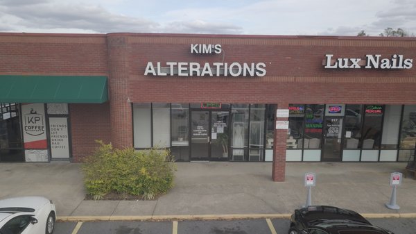 Kim's Alteration located in the Tega Cay Village shopping plaza.