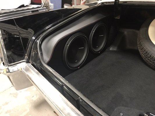 Custom fabricated subwoofer enclosure for 1970 Cadillac