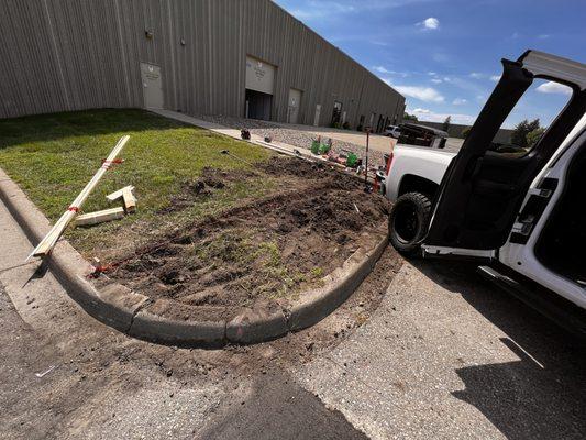 Removing dirt for sidewalk