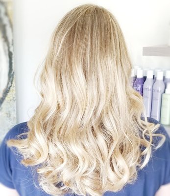 Beautiful customized blonding using foil and balayage combo.