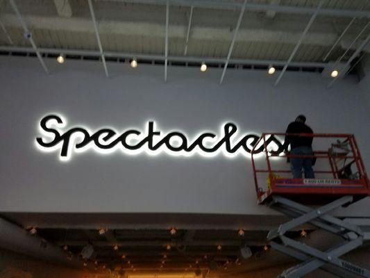 Interior halo lit letters utilizing corporate logo