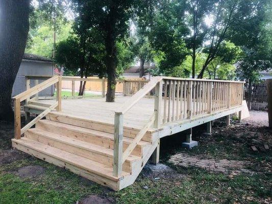 Custom decks. Customer did not want to lose the shade from the tree. We took care of their needs.