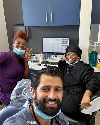 Dr. Adil Khan with his fellow colleagues at Davie Designer Dental Office