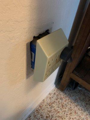 One of the many receptacles falling out of the wall. Not a mention in any report.